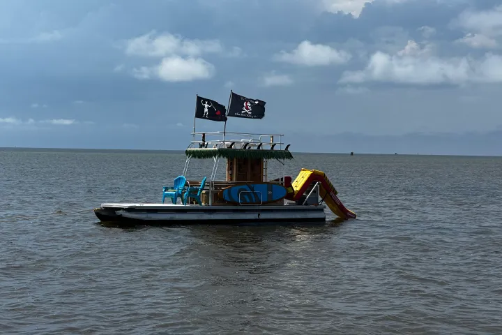 a boat floating on a body of water